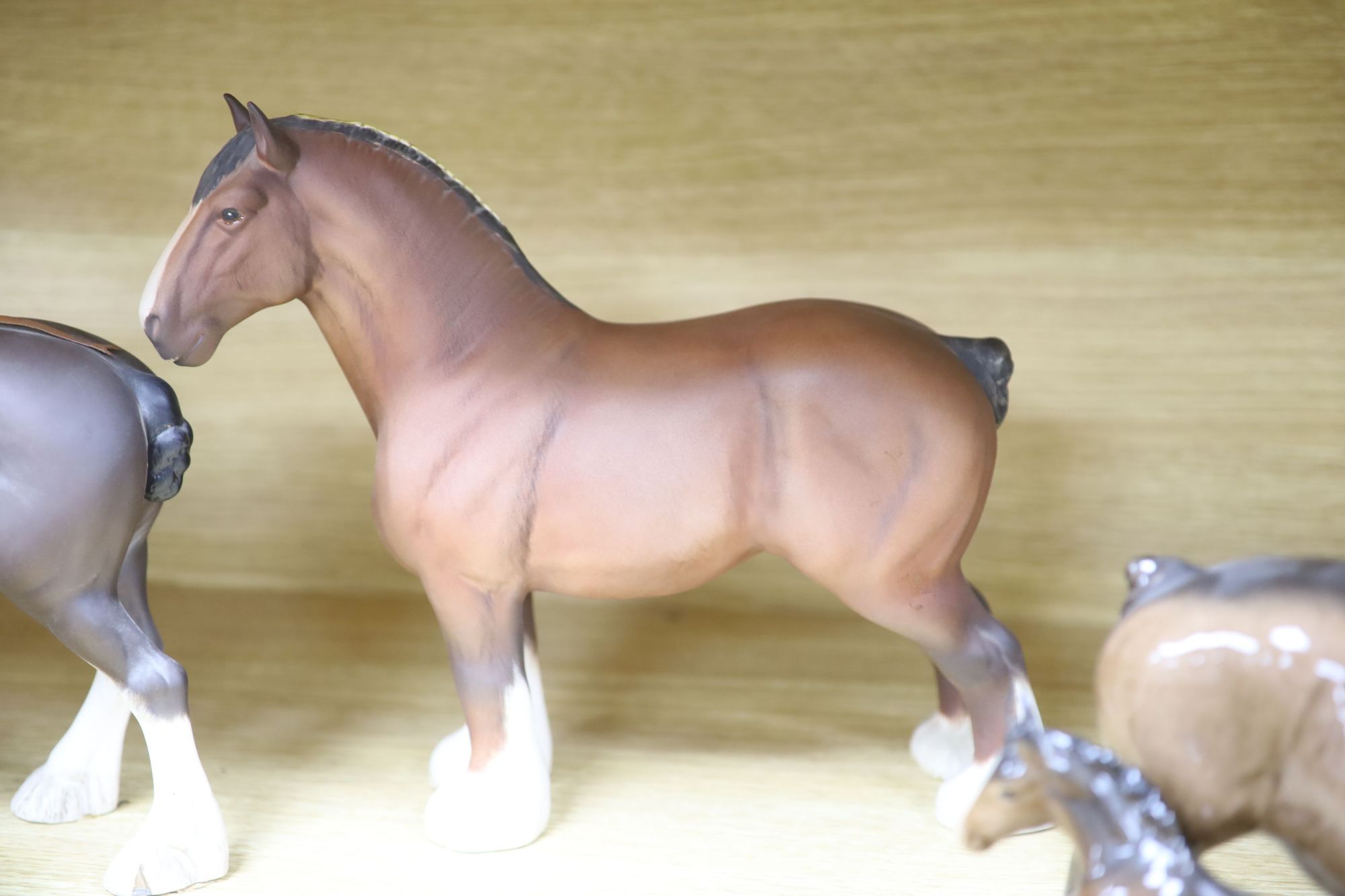 Five Beswick shire horses and a foal